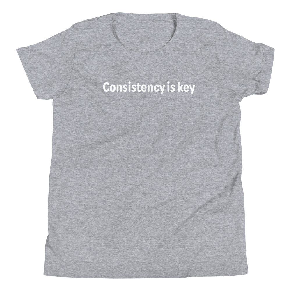 Consistency is key - White text - Youth Short Sleeve T-Shirt